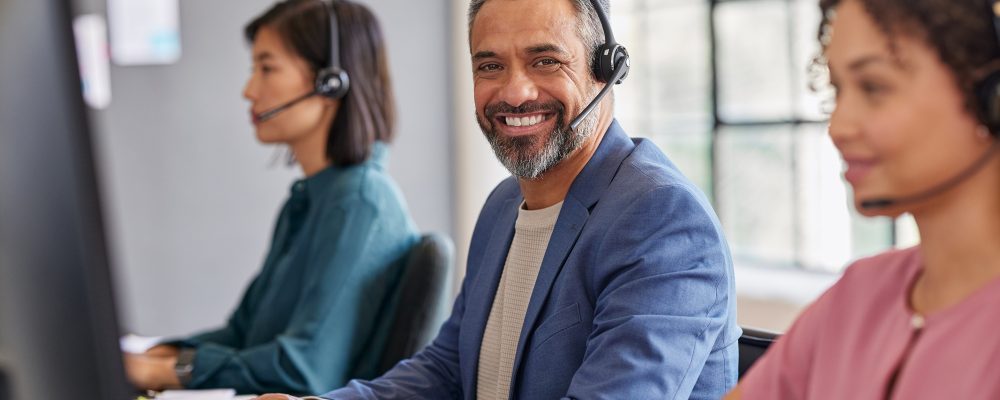 Portrait of professional call center agent looking at camera